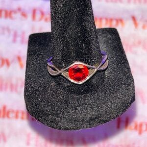 Elegant Silver Ring with Red Gemstone